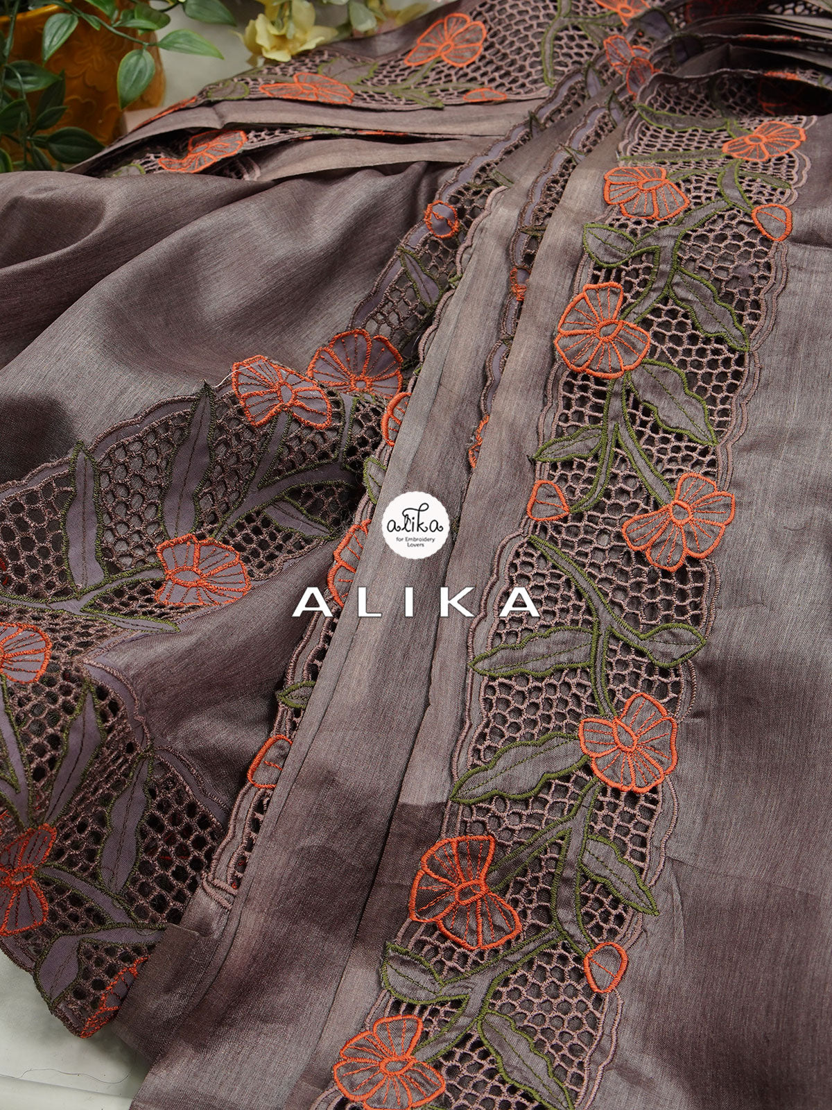 Earth & Elegance: Brown Tussar Silk Saree with Intricate Cutwork Border