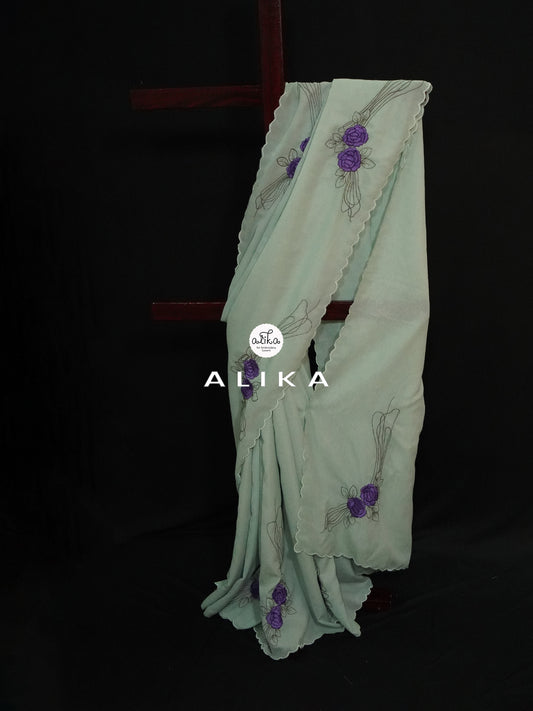 LIGHT GREEN SOFT SILK SAREE WITH VIOLET FLORAL MACHINE EMBROIDERY