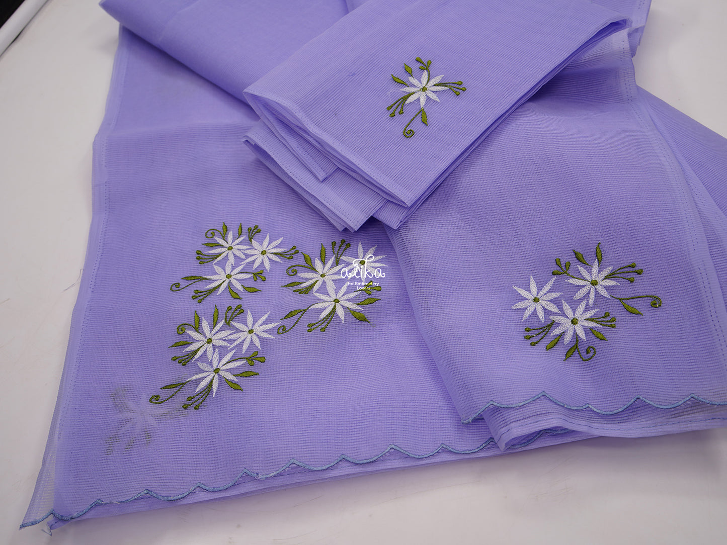 LAVENDER KOTA SAREE WITH WHITE FLORAL MACHINE EMBROIDERY