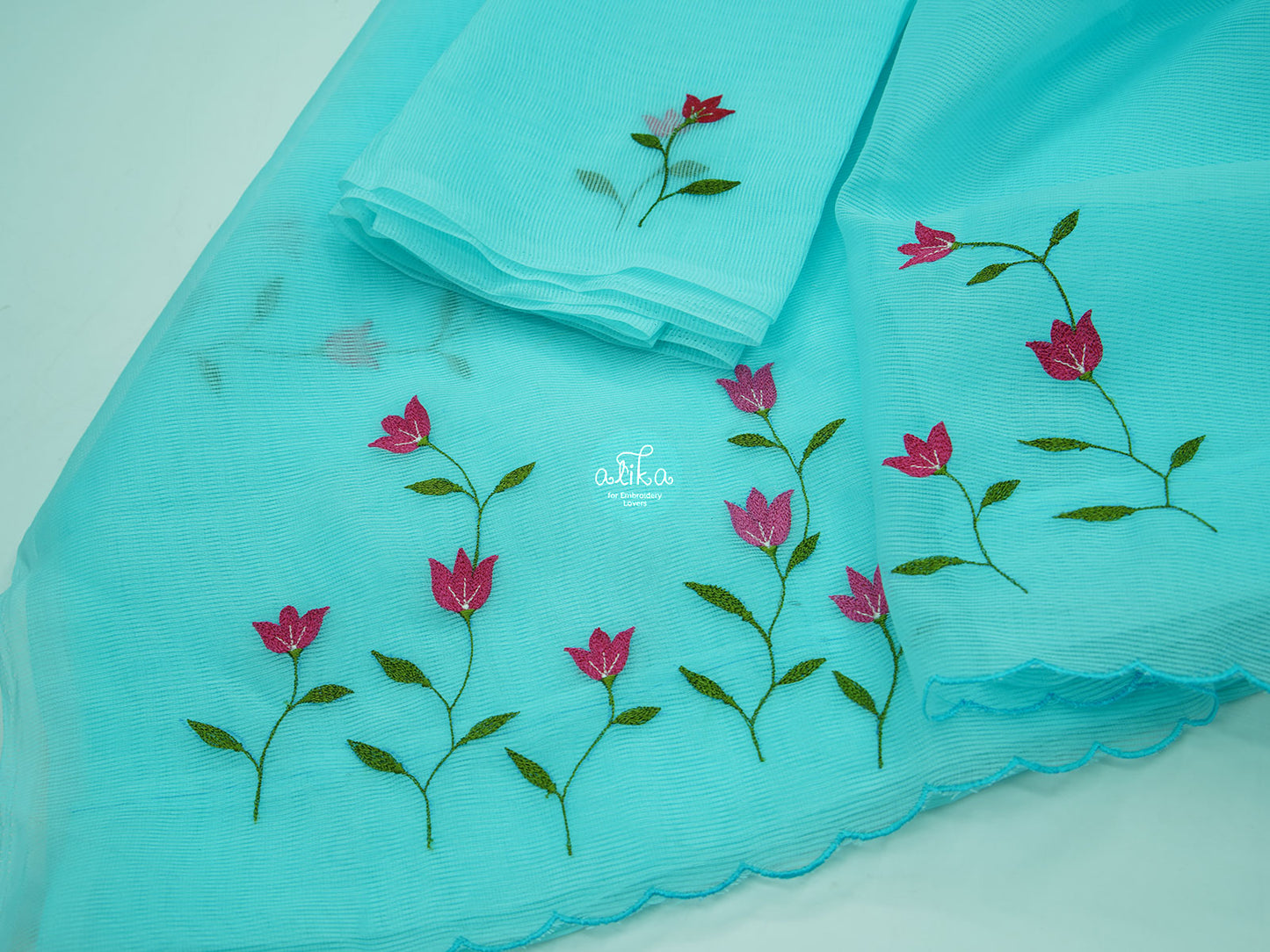 CYAN SHADED KOTA SAREE WITH  WHITE FLORAL MACHINE EMBROIDERY