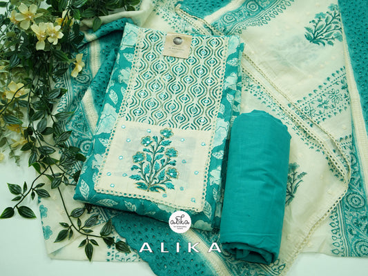 self printed turquoise blue patch and mirror worked cotton salwar suit