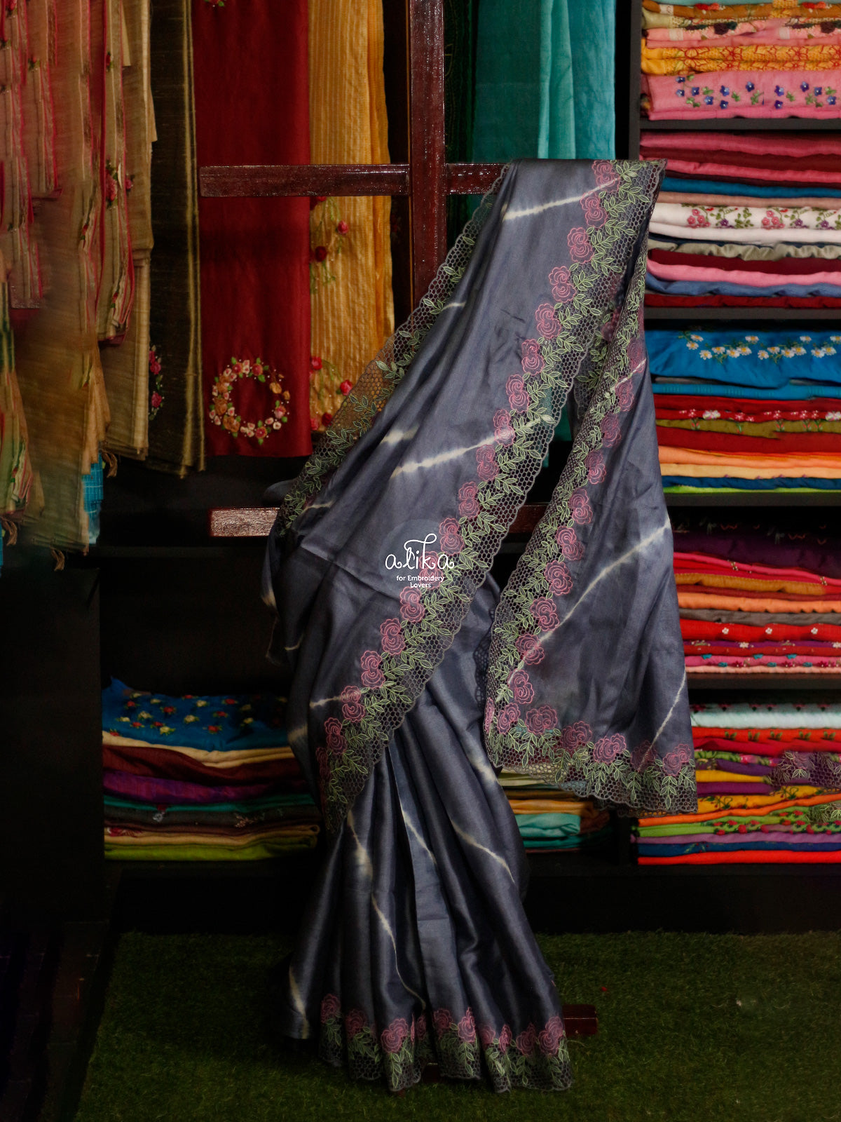 GREY TUSSAR SILK SAREE WITH full border  cutwork and floral machine embroidery