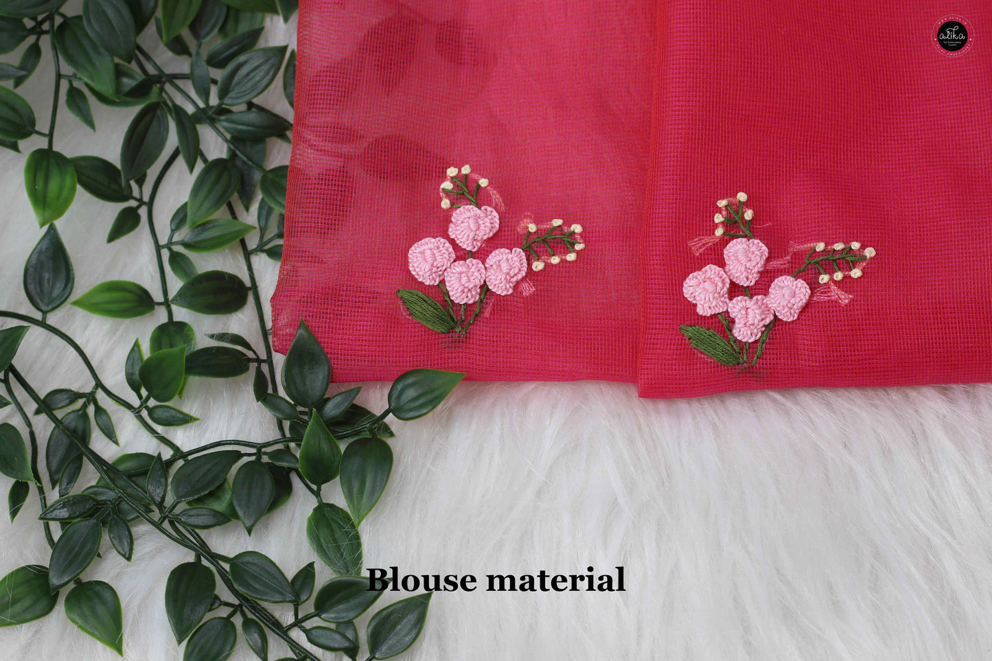 Warm pink kota saree with floral hand embroidery