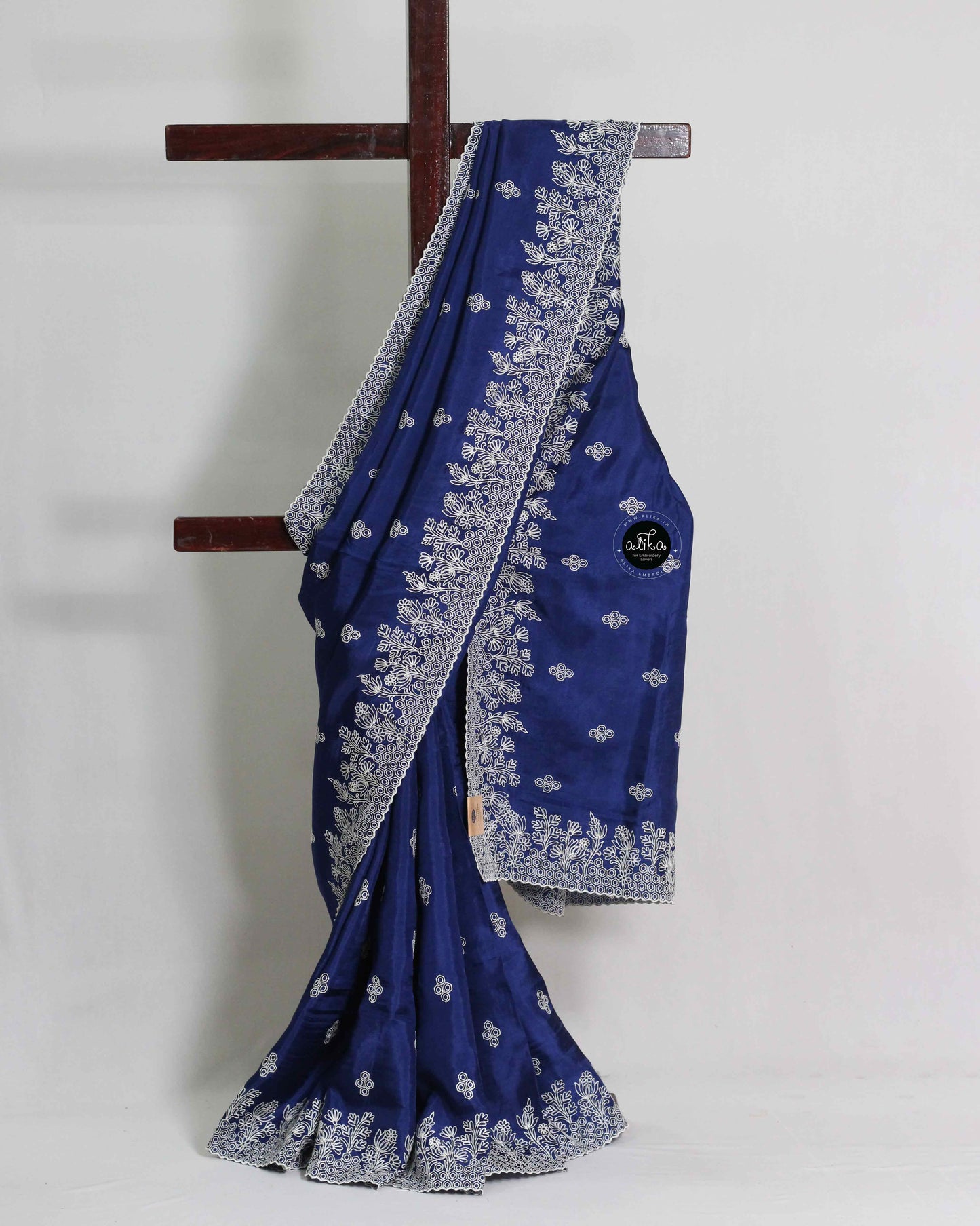 Navy Blue Uppada Silk Saree with White Machine Embroidery