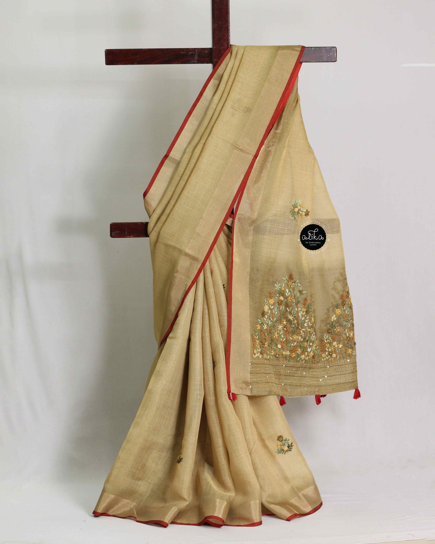 Golden Yellow Tissue Linen Saree with Floral Hand Embroidery – Luxury Wear
