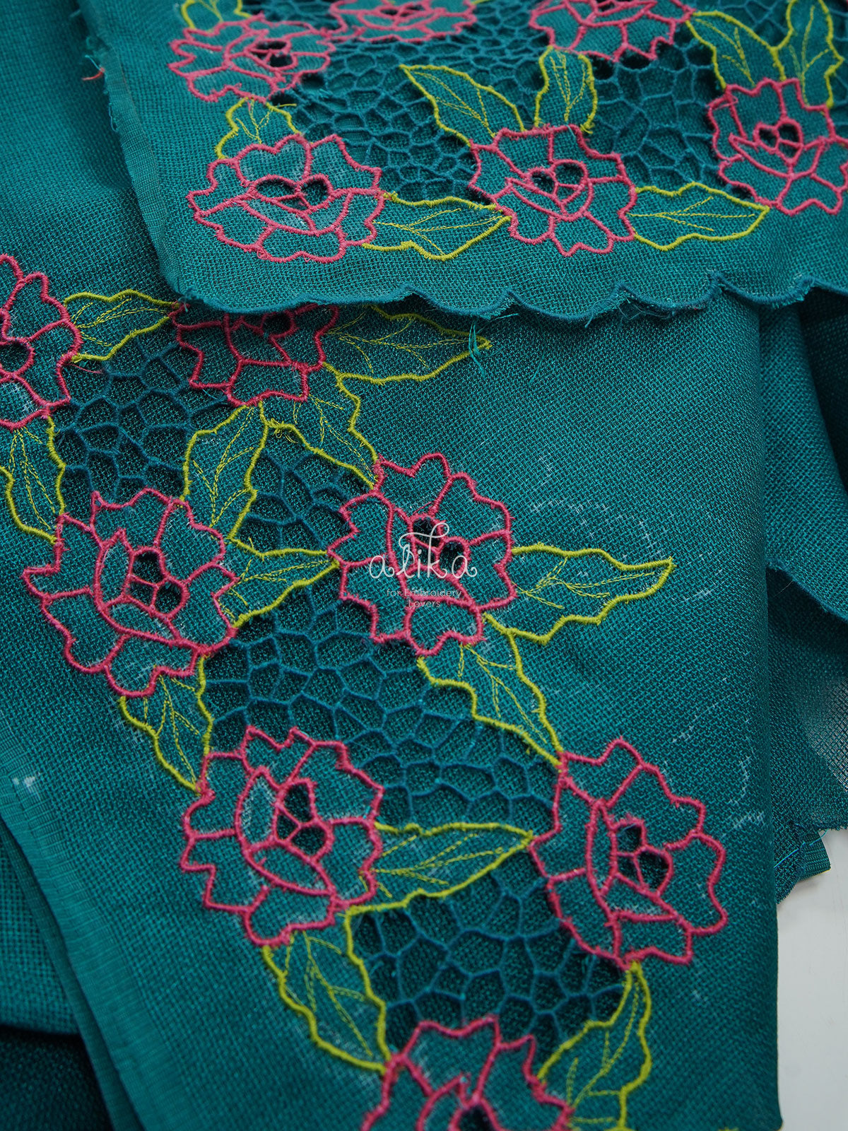 PEACOCK GREEN JUTE NETSAREE WITH TWINE CUTWORK AND FLORAL MACHINE EMBROIDERY
