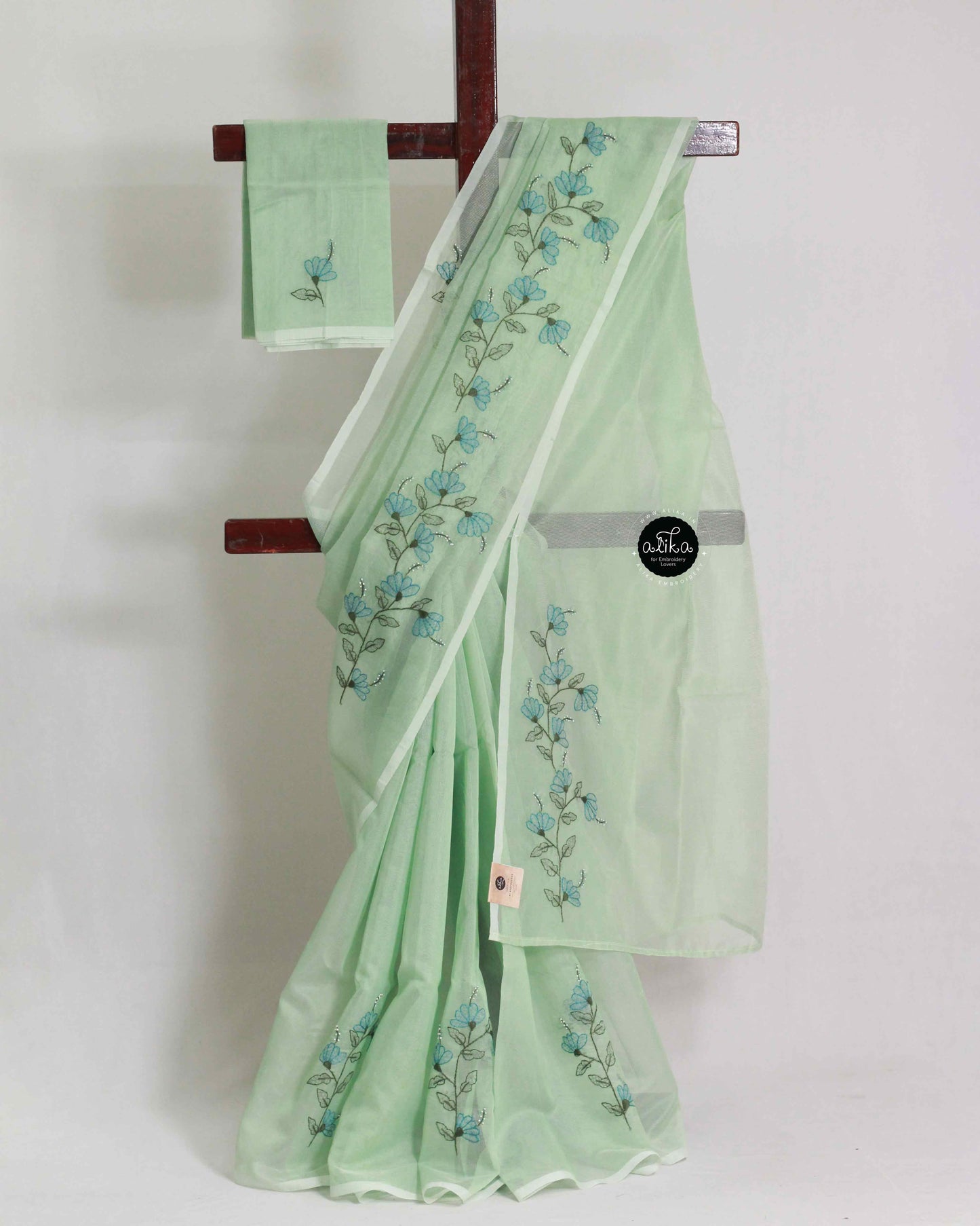 Pista Green Kota Saree with Floral Shadow and Bead Work