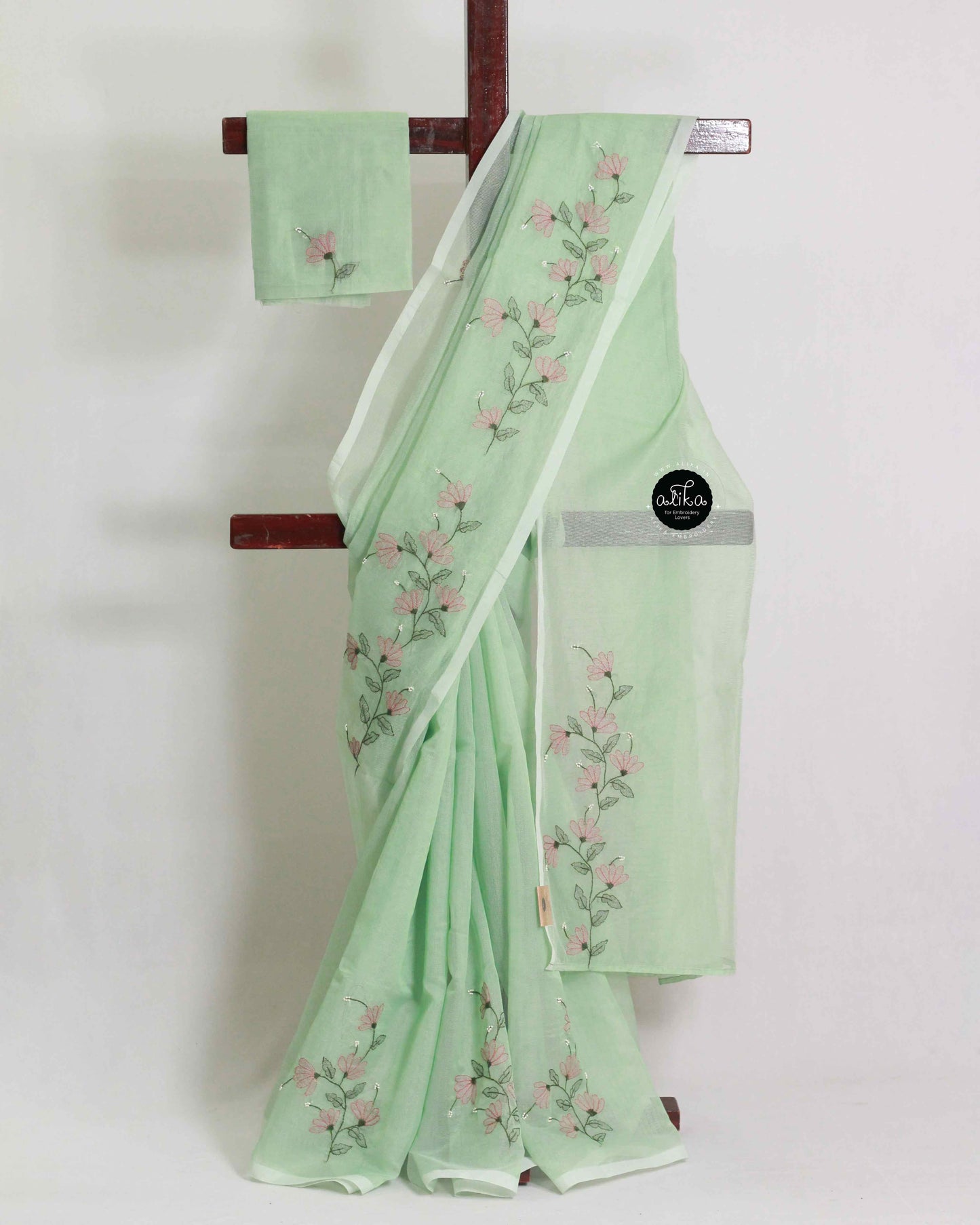Pista Green Kota Saree with Brown Floral Shadow and Bead Work