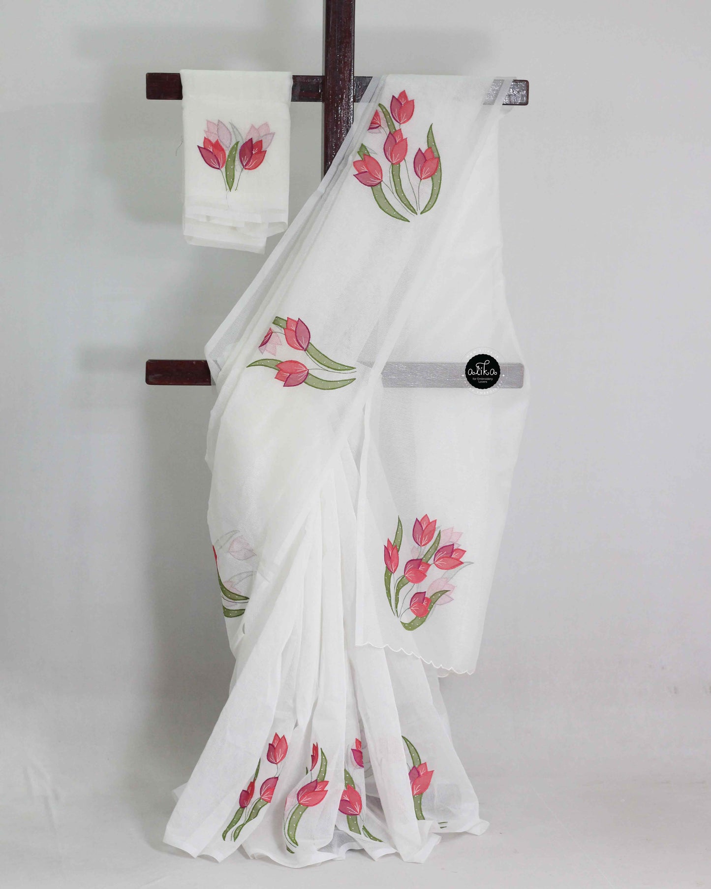 white kota saree with multi colour applique work