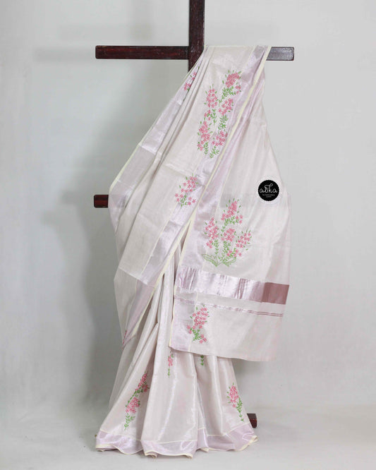 Lavender Tinted Kerala Saree with Floral Lazy Daisy Embroidery and Bead Work