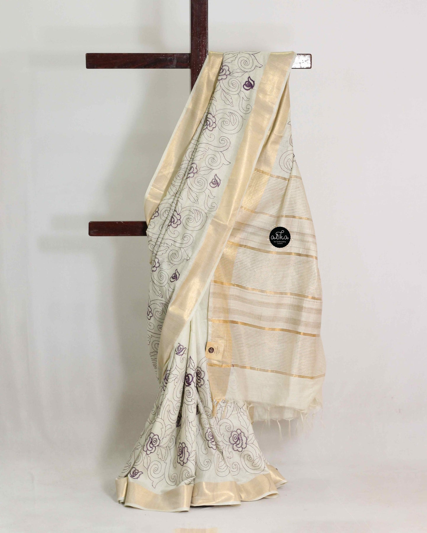 Cream And purple Chanderi Silk Saree with Floral Machine Embroidery