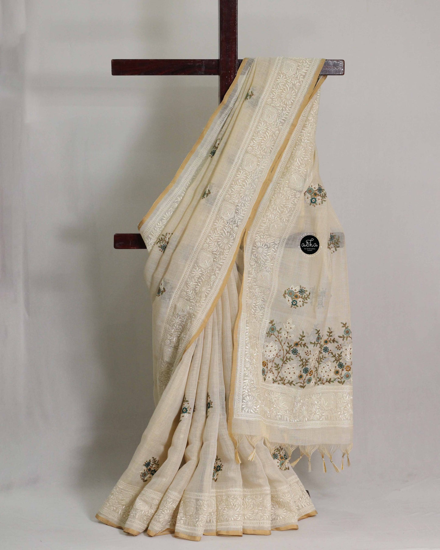 Light Beige Linen Tissue Saree With Blue Floral Machine embroidery
