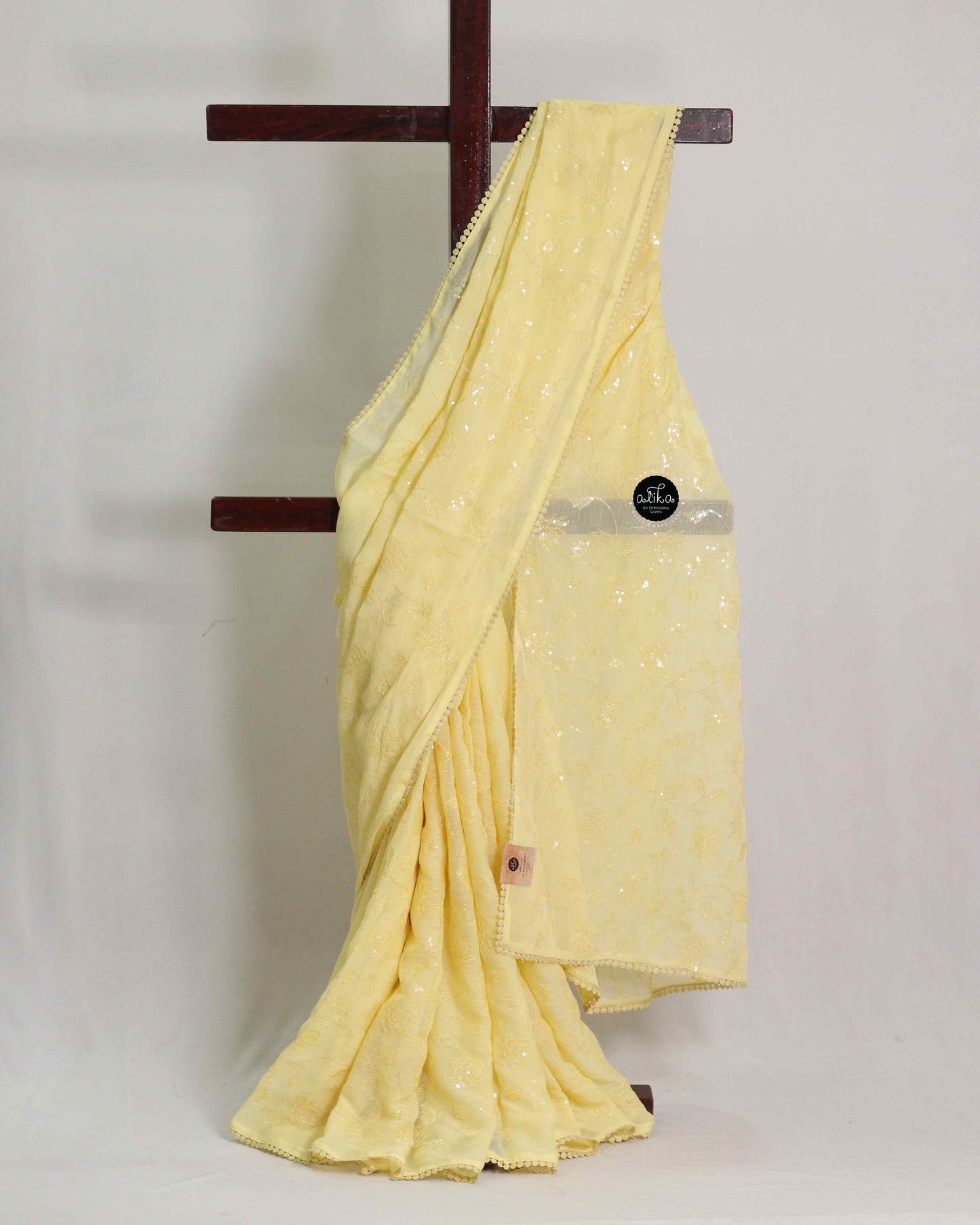 Pastel Yellow Georgette Saree with Sequinned Embroidery