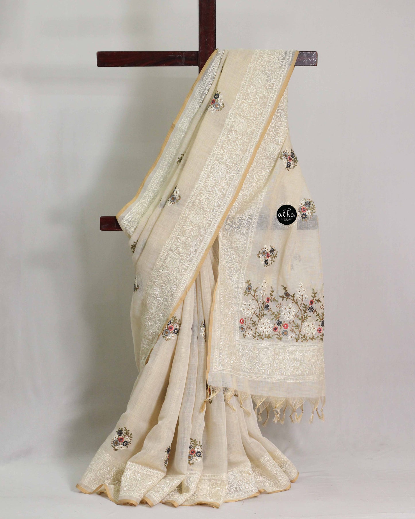 Light Beige Linen Tissue Saree With Multi Colour Floral Machine embroidery