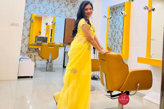 "Daily wear yellow embroidered kota saree with intricate designs and patterns, made from high-quality fabric."