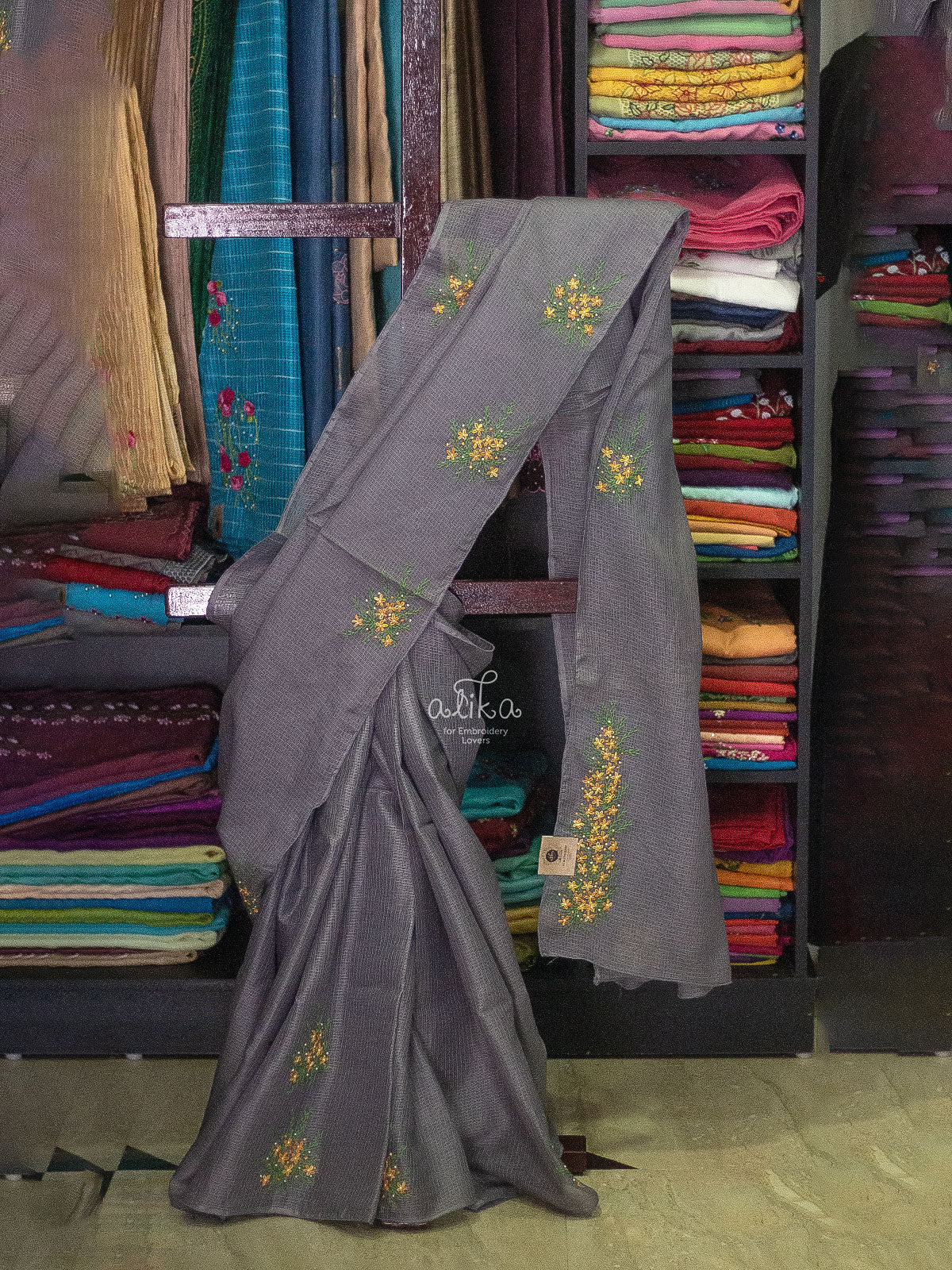 Grey check kota saree with lazydaisy embroidery