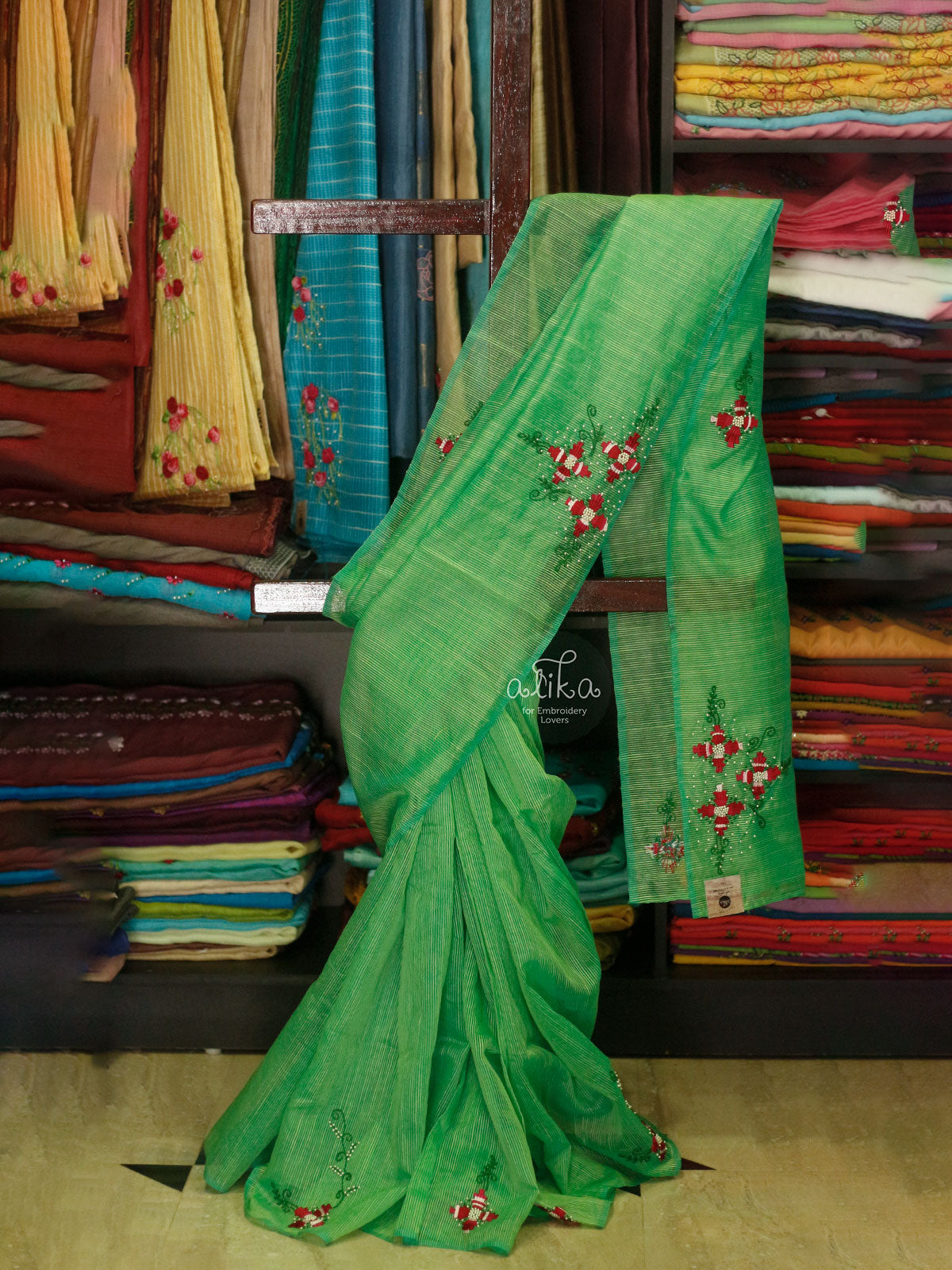 GREEN STRIPED KOTA  SAREE  WITH BEADS AND HAND EMBROIDERY