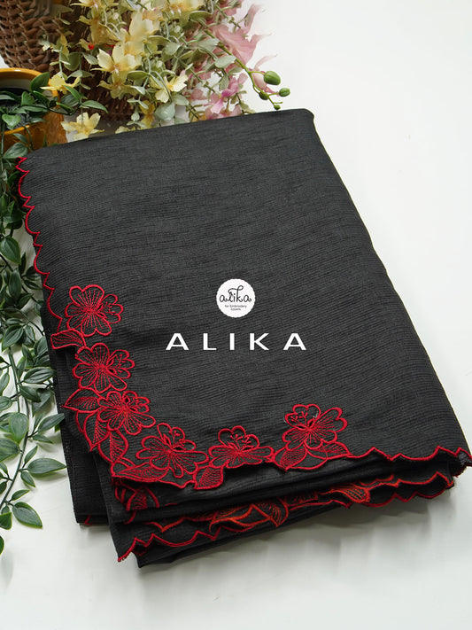 Mesmerizing Black Semi striped tussar Saree with Vibrant Red Machine Floral Embroidery & Scalloped Border