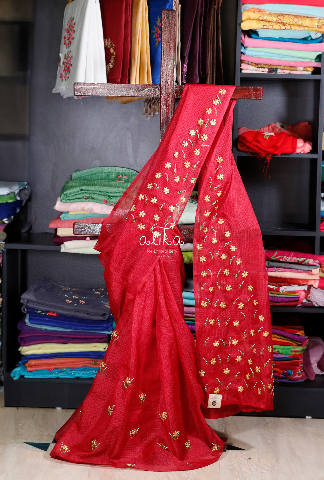 Bold Elegance: Dark Red Checked Kota Saree with Ribbon and Pearl Work