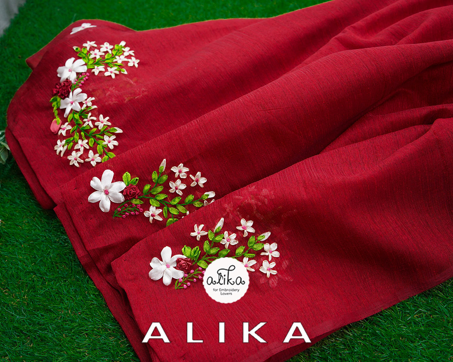Discover Elegance with Alika's Red Semi RAW silk Saree