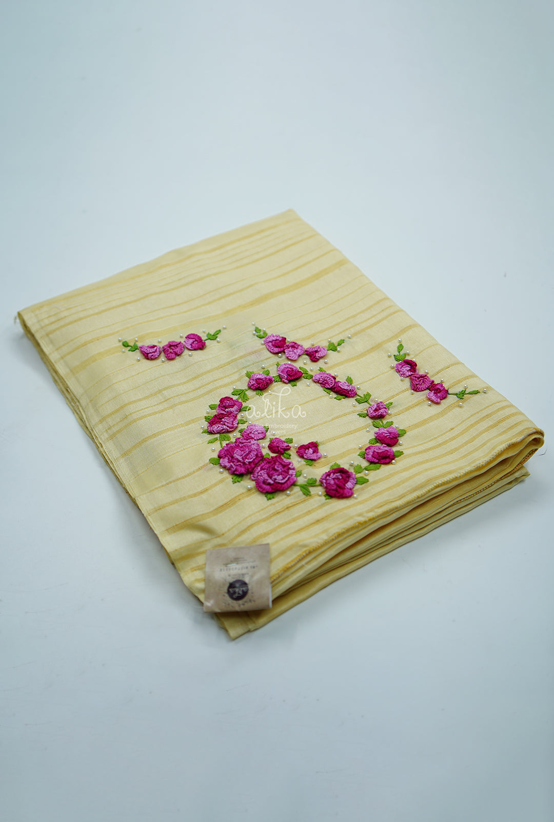 yellow semi rawsilk  saree with pink multi coloured caston embroidery