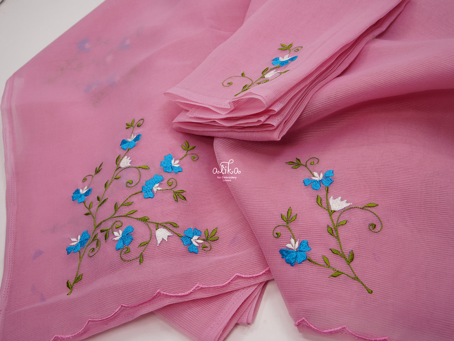 PINK KOTA SAREE WITH WHITE AND BLUE FLORAL MACHINE EMBROIDERY