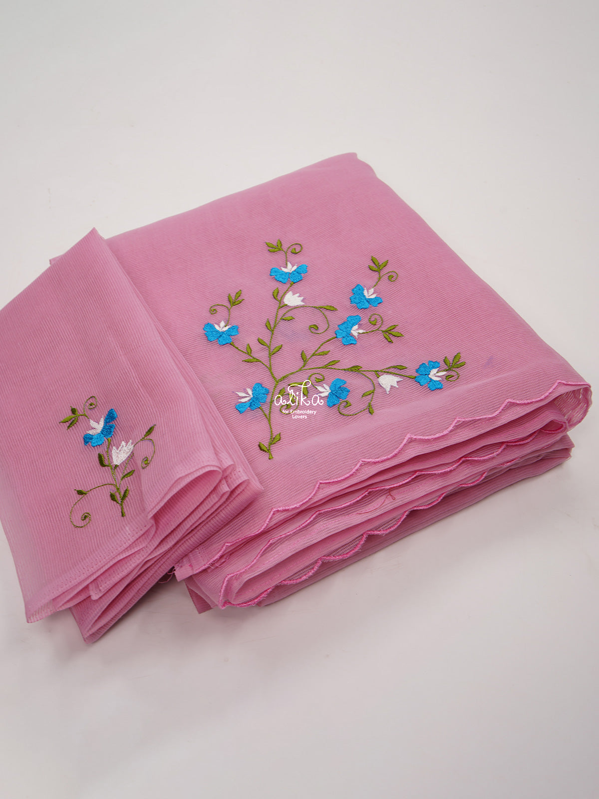 PINK KOTA SAREE WITH WHITE AND BLUE FLORAL MACHINE EMBROIDERY