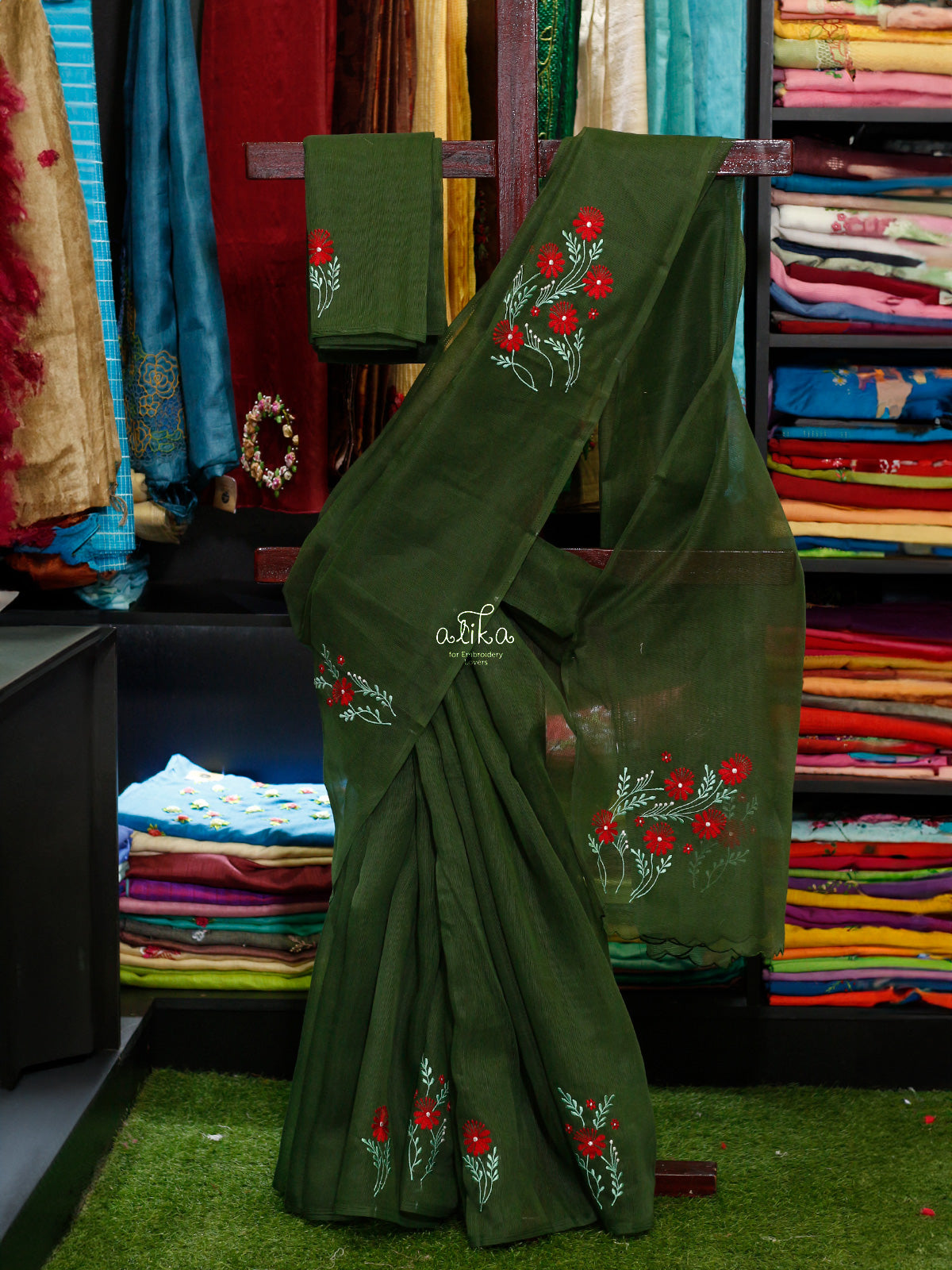 GREEN KOTA SAREE WITH FLORAL MACHINE EMBROIDERY