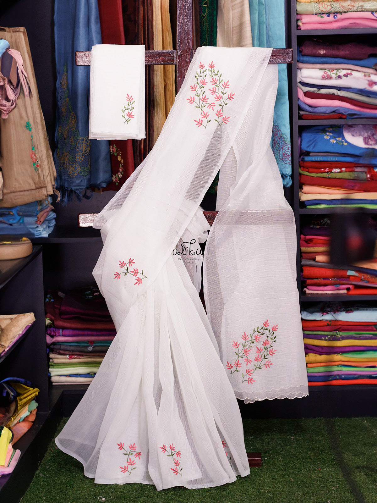OFF WHITE KOTA SAREE WITH FLORAL MACHINE EMBROIDERY