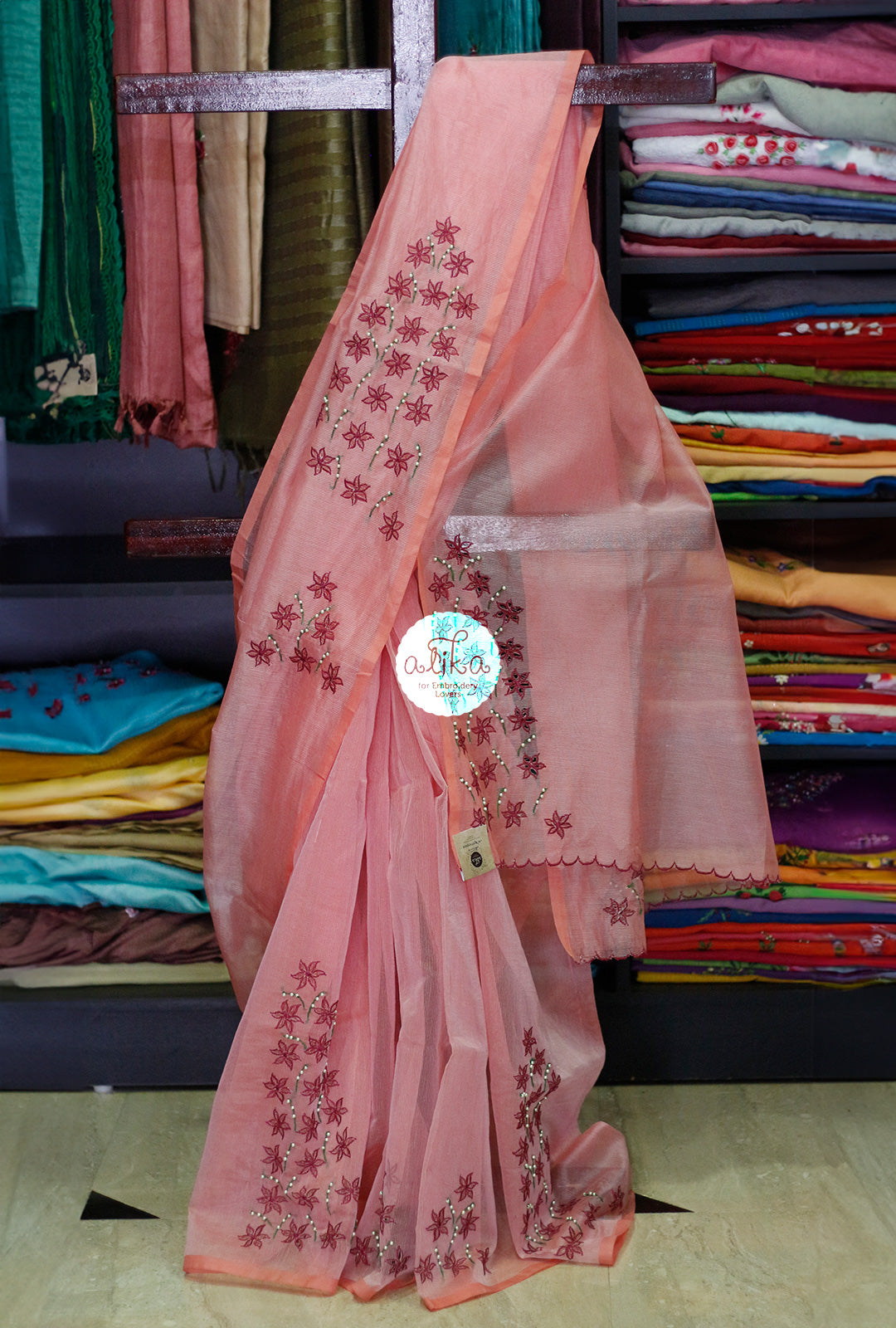 Chic Peach Striped Kota Saree with Red Floral Cut Work and Pearl Embellishments