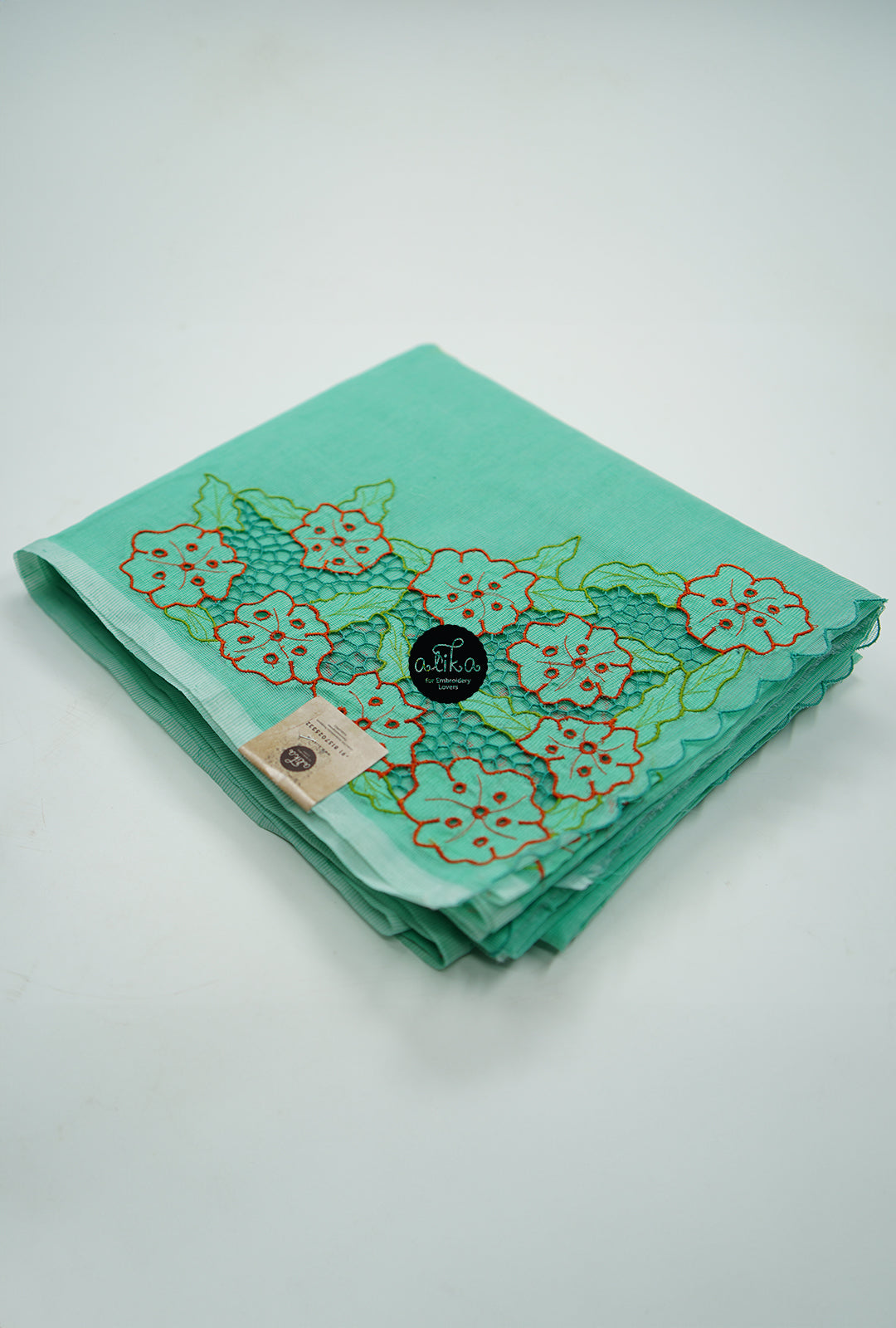 GREEN SILKY KOTA SAREE WITH TWINE WORK AND FLORAL EMBROIDERY