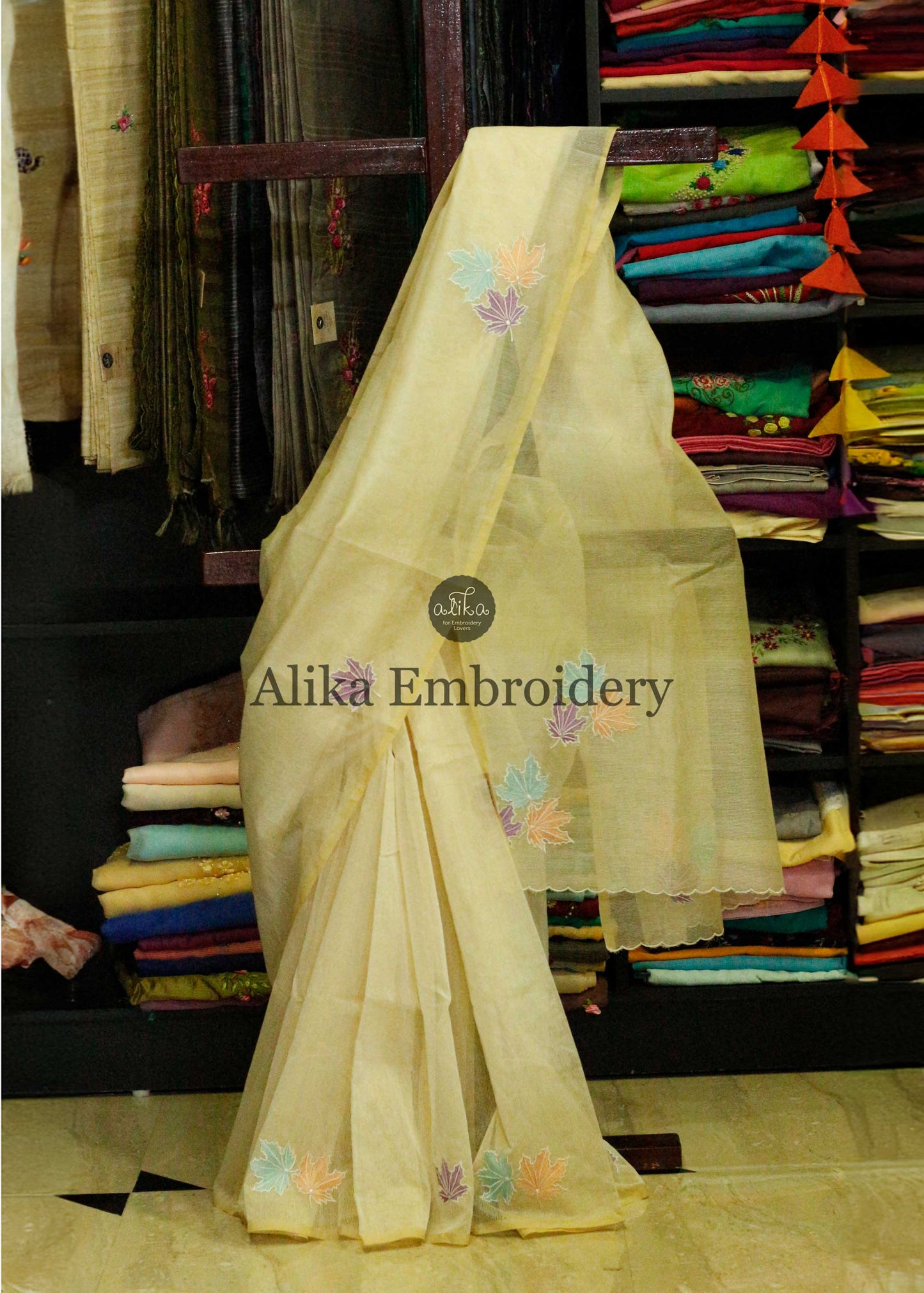 "Effortless Elegance: Daily Wear Beige Silky Kota Saree with Intricate Machine Work"