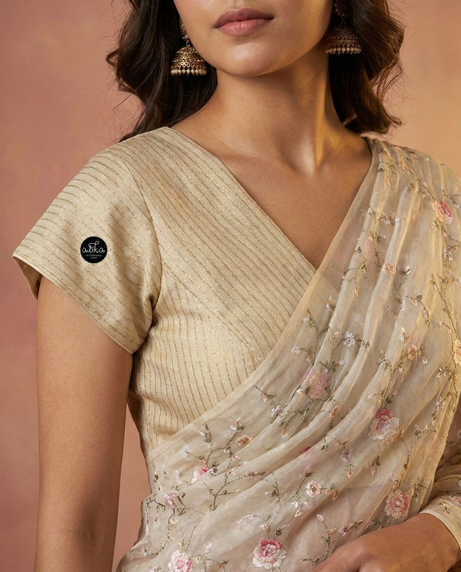 Ivory and Gold themed Organza Saree with Floral Embroidery