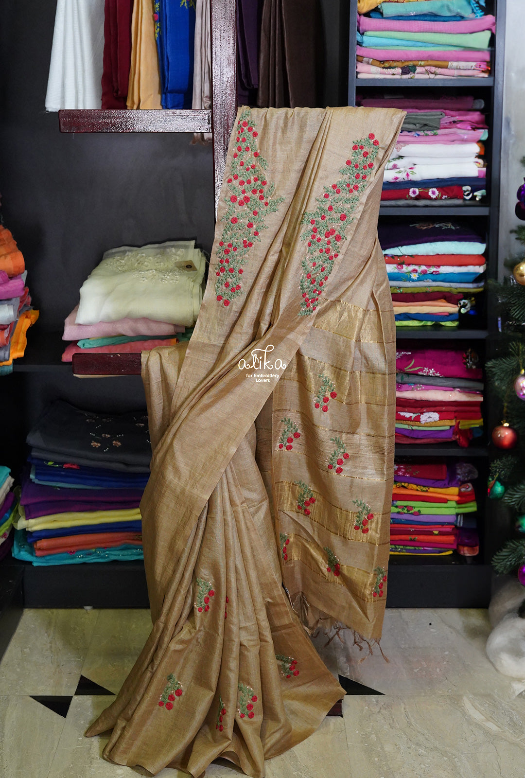 Timeless Grace: Beige Tussar Silk Saree with Red and Green Hand Embroidery