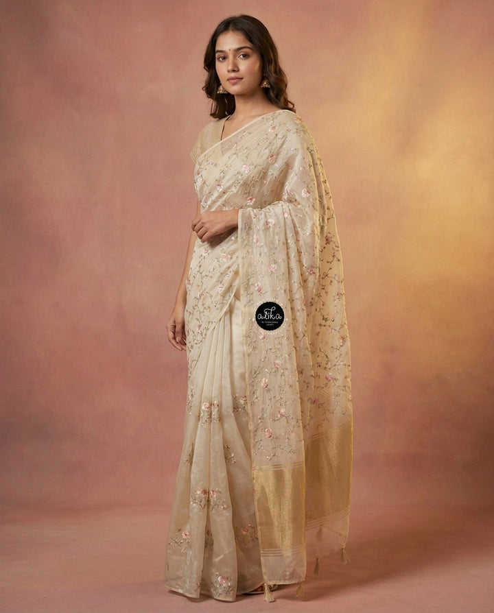 Ivory and Gold themed Organza Saree with Floral Embroidery