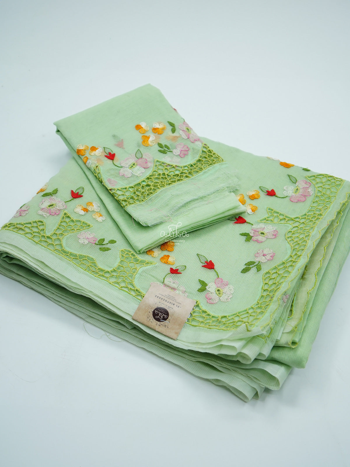 LIGHT GREEN SILKY KOTA SAREE WITH CUT WORK AND HAND EMBROIDERY