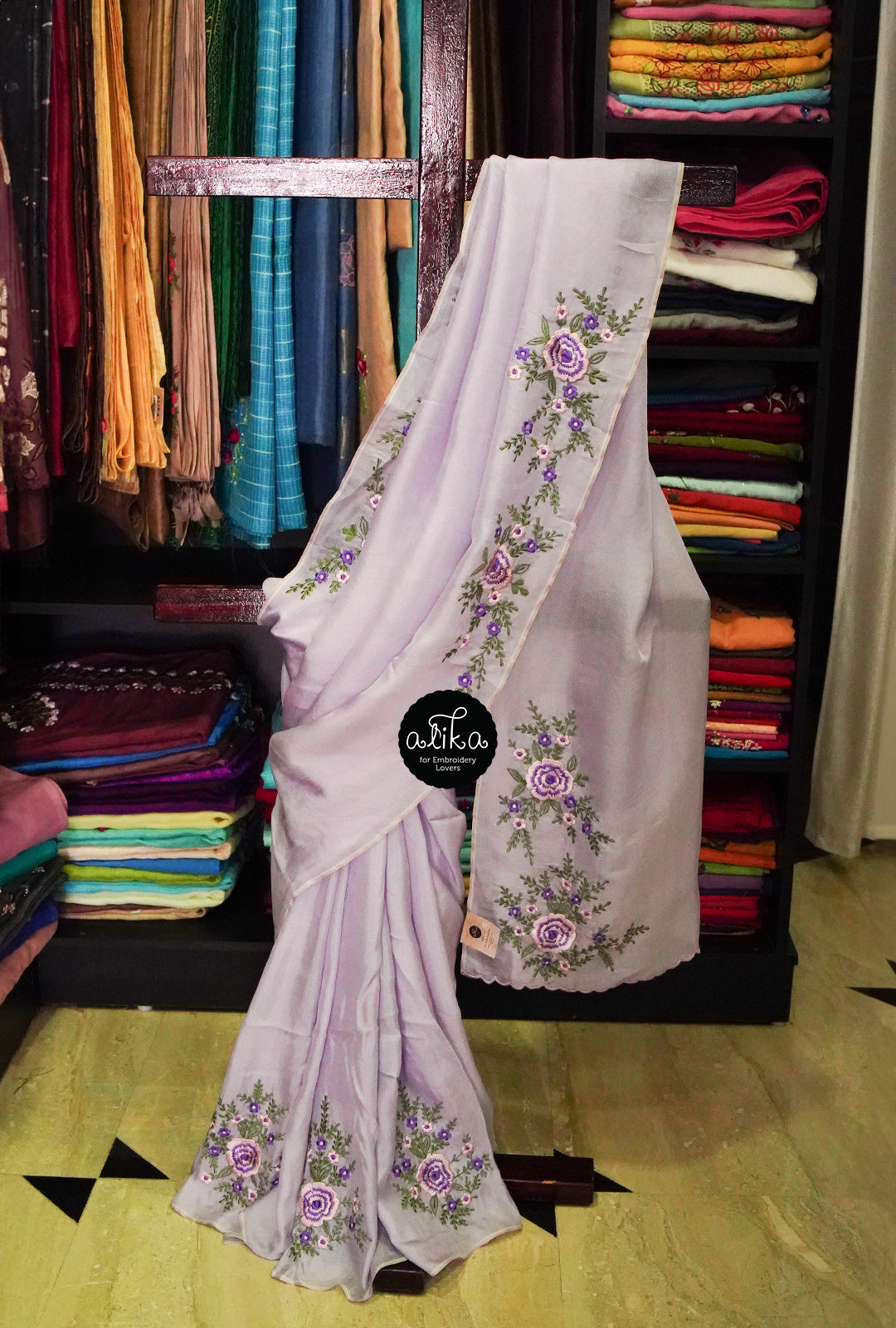 LAVENDER CRISPY GEORGETTE SAREE WITH BABY PINK AND VIOLET FLORAL MACHINE EMBROIDERY