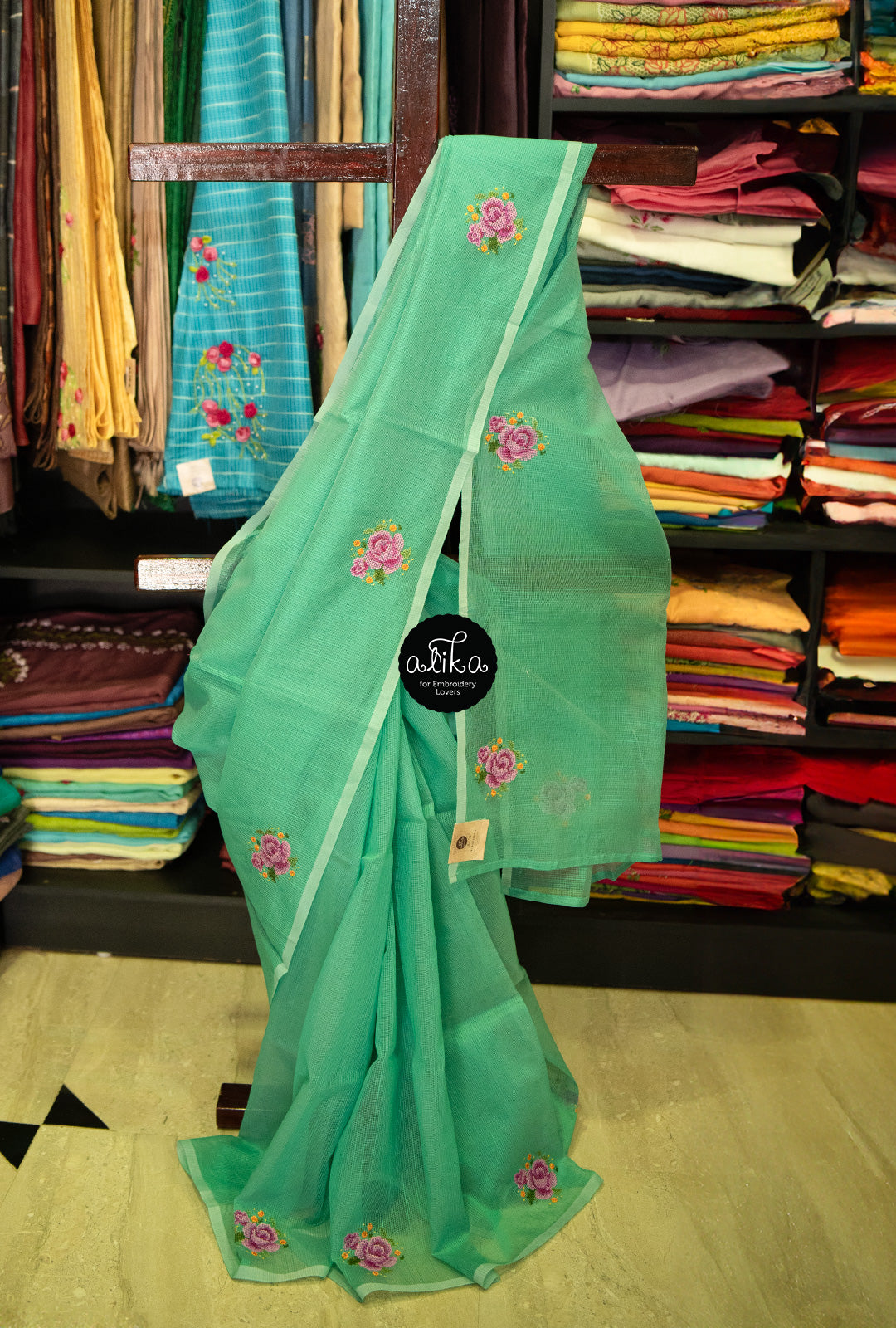 GREEN STRIPED KOTA SAREE WITH FLORAL CROSS STITCH EMBROIDERY