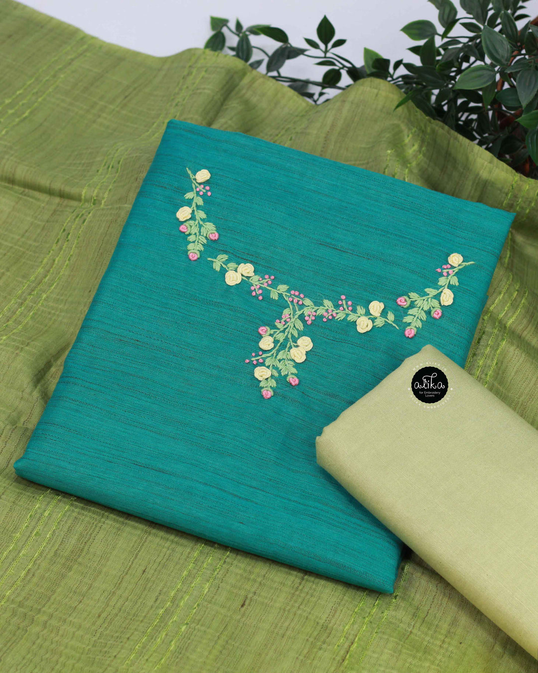 Teal Green Bamboo Silk Unstitched Salwar Set with Floral Hand Embroidery on the neckline and sleeves