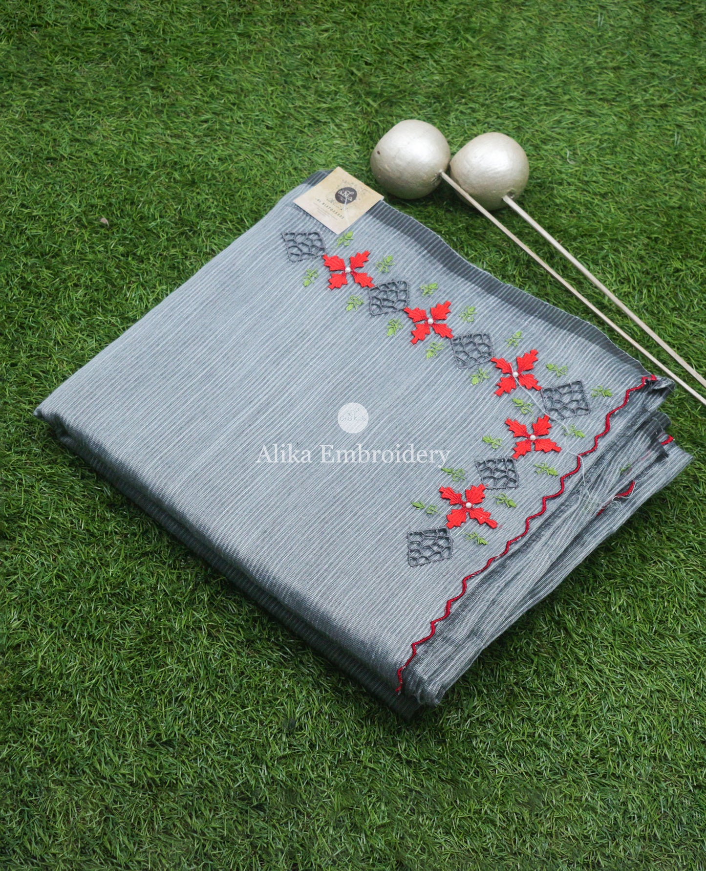 Sophisticated Grey Striped Kota Saree with Red Floral Embroidery and Cutwork