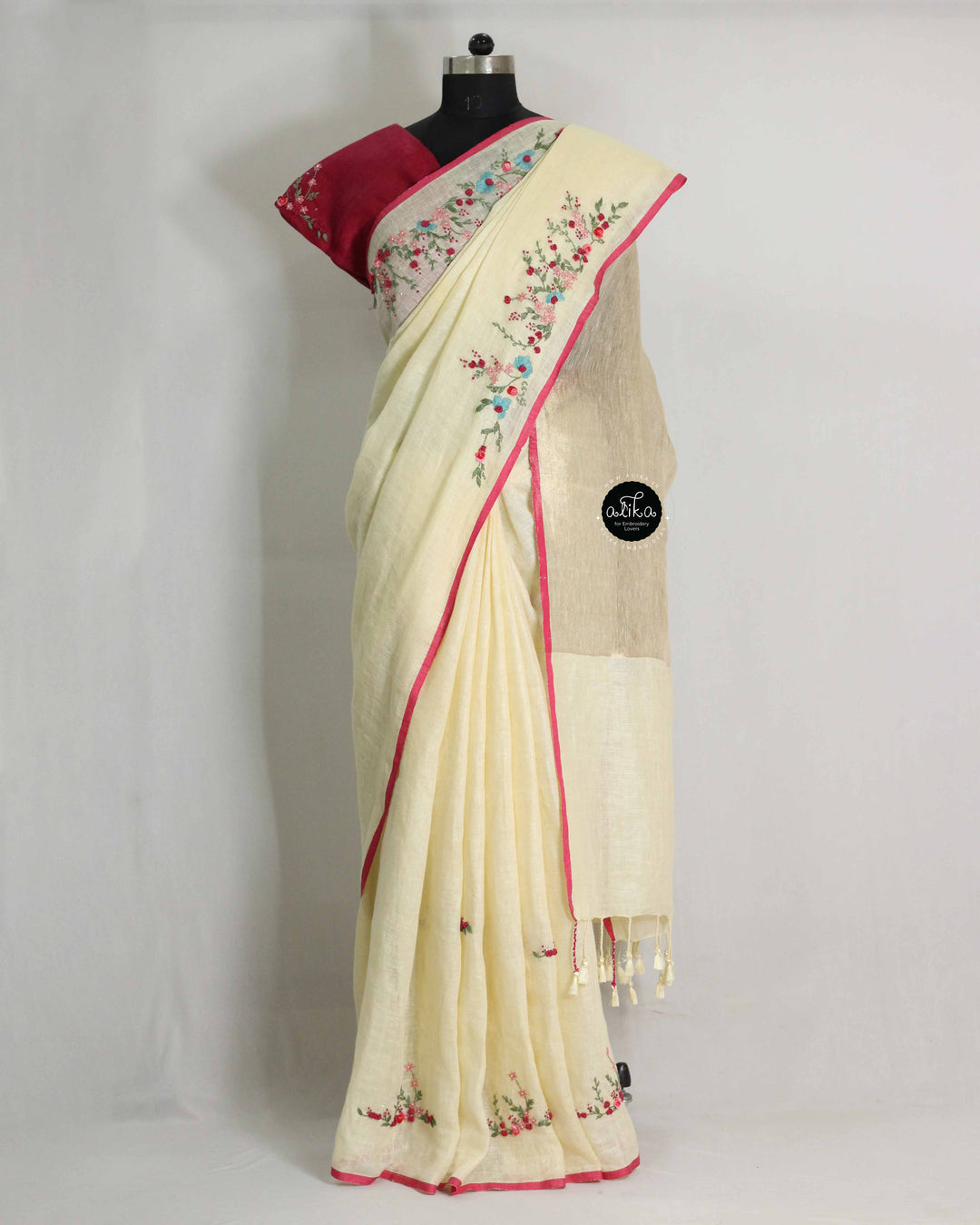 Cream Pure Linen Onam Saree with Golden Zari Pallu &amp; Multicolour Floral Hand Embroidery