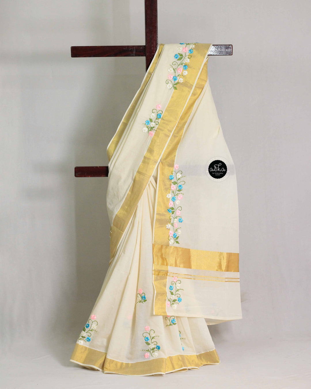 Cream Kerala Saree with Floral Multicolor Ribbon Work