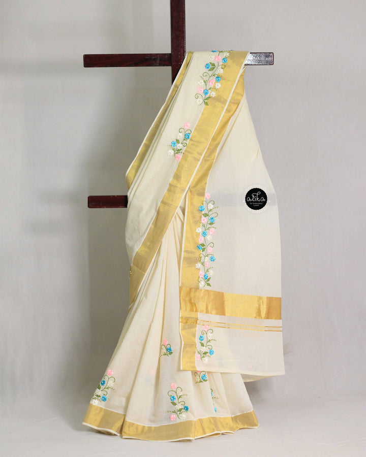 Cream Kerala Saree with Floral Multicolor Ribbon Work