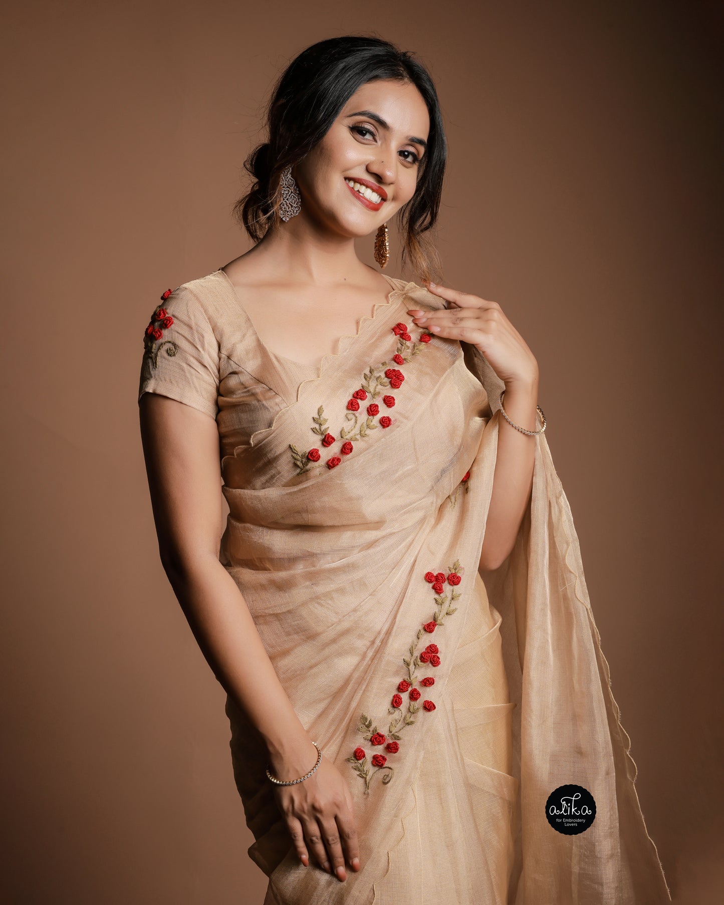 Pure golden tissue saree with floral hand embroidery