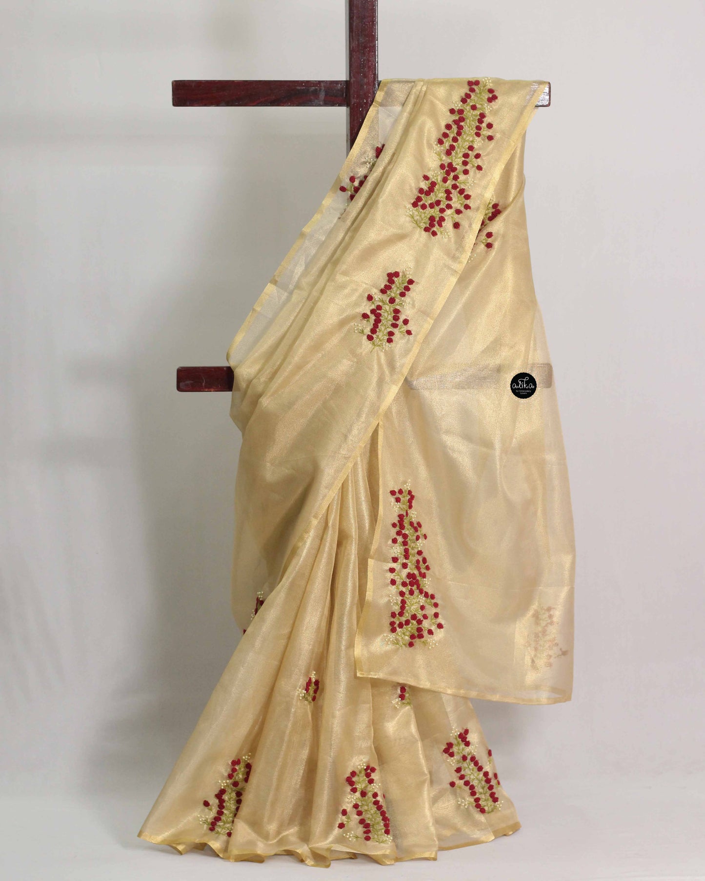 Golden Tissue Saree with Maroon Floral Embroidery and Bead Work