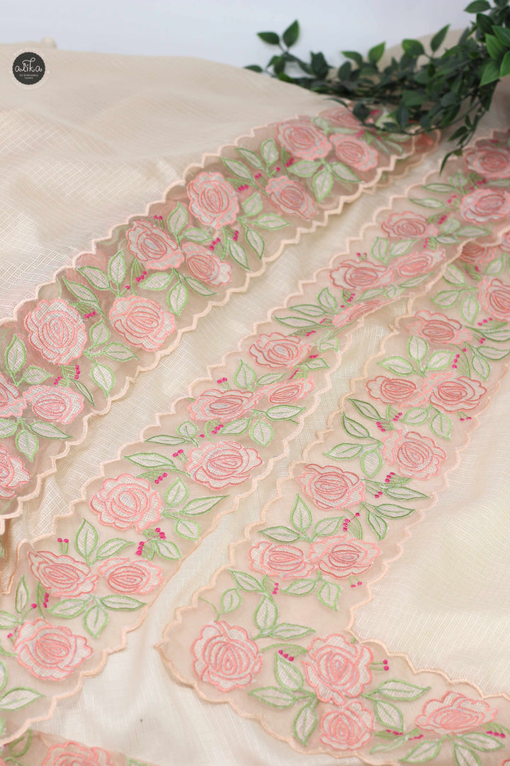 Beige Silky Kota Saree with Floral Appliqué Border