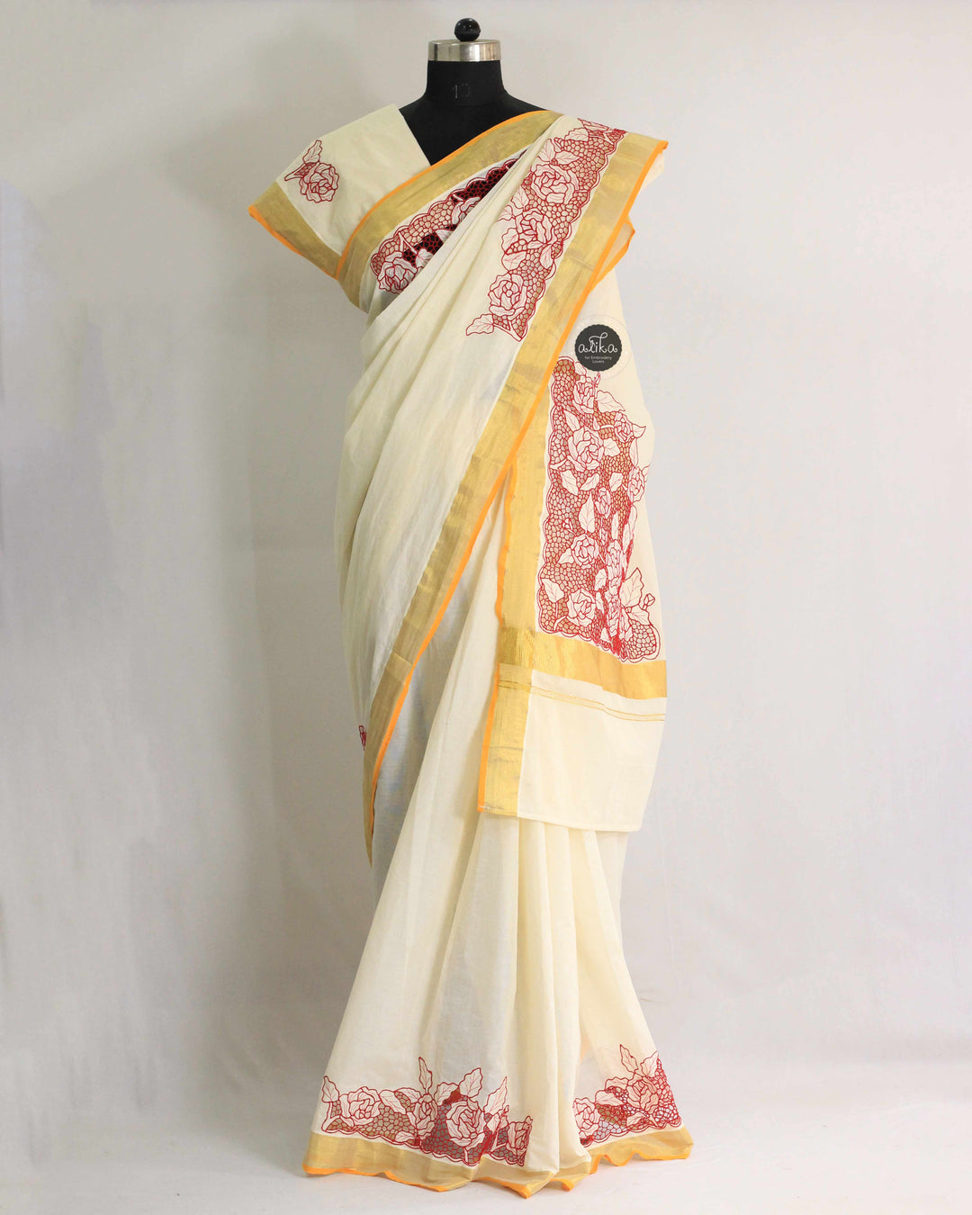 Cream Kerala Saree with Red Border &amp; Floral Twine Cutwork
