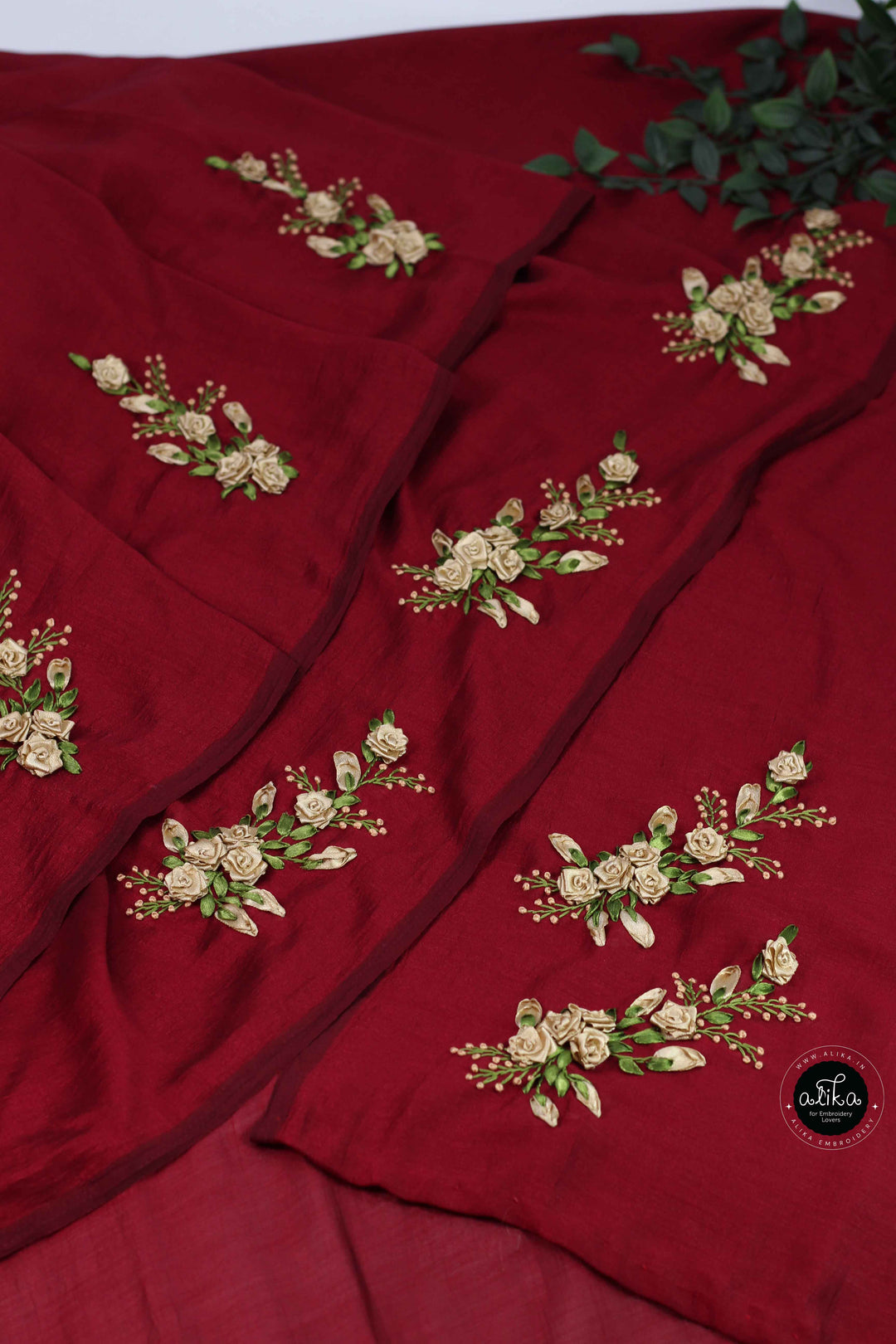 Maroon Designer Silk Saree with Golden Floral Ribbon Work