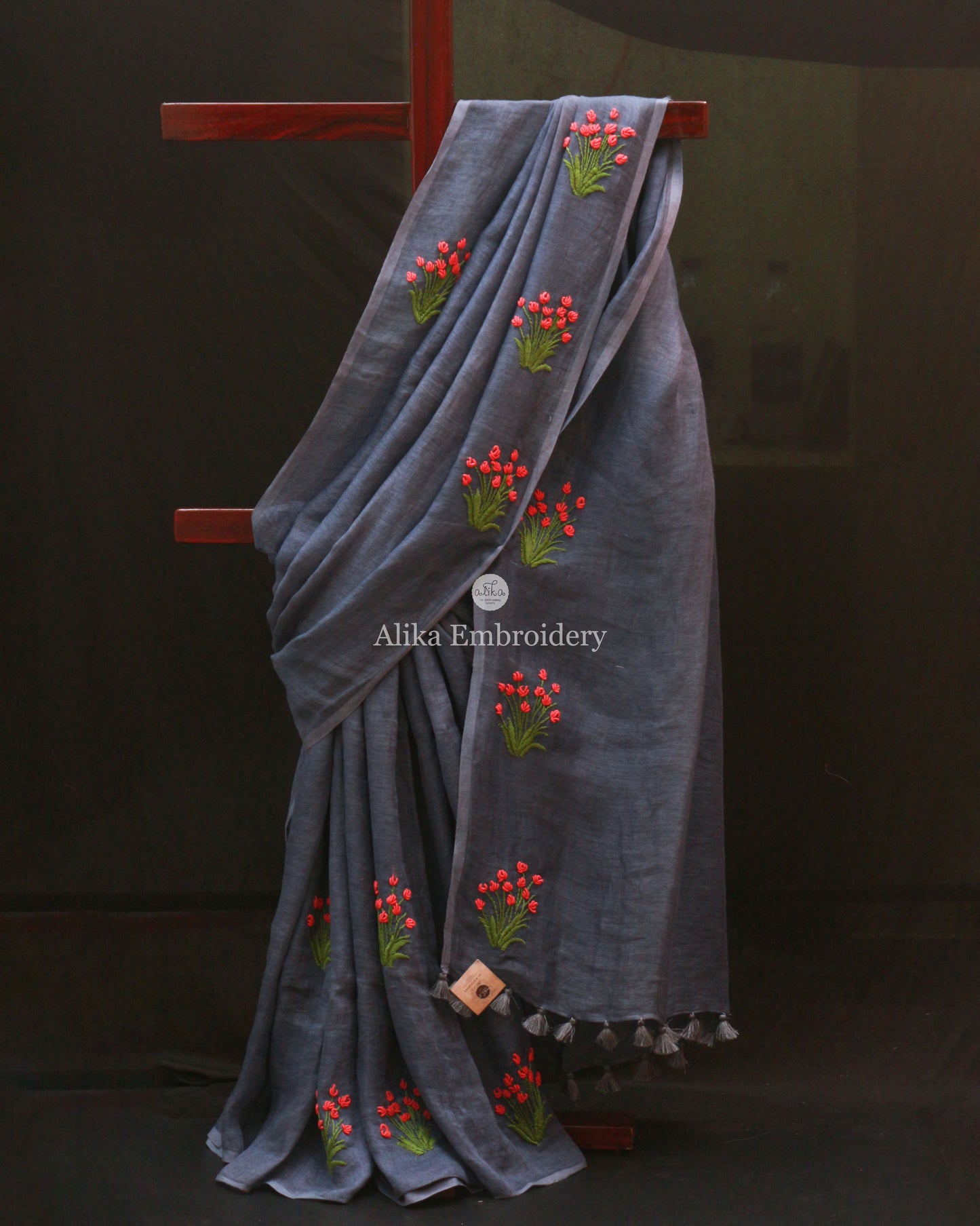 Grey linen saree with peach floral bullion bunches