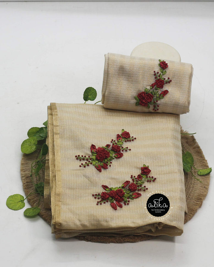 Gold Semi tissue Saree with Golden Stripes and Maroon Ribbon Work